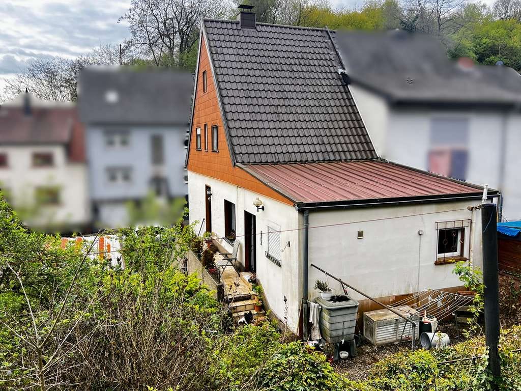 Immobilie in Großrosseln - Doppelhaushälfte mit Garten und Garage - Ihr Sanierungsprojekt mit Potenzial in Großrosseln - Bild 2