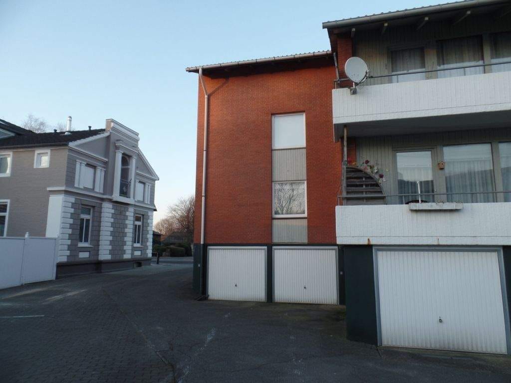 Immobilie in Heide - Mehrfamilienwohnhaus mit 4 Wohnungen, 6 Garagen - Bild 4