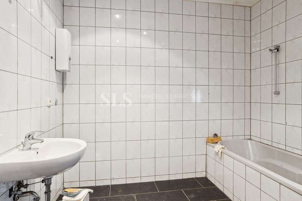 Immobilie in Dortmund - Dreifamilienhaus in Dortmund – laufende Mieteinnahmen und freie Erdgeschosswohnung mit Potenzial - Bild 2