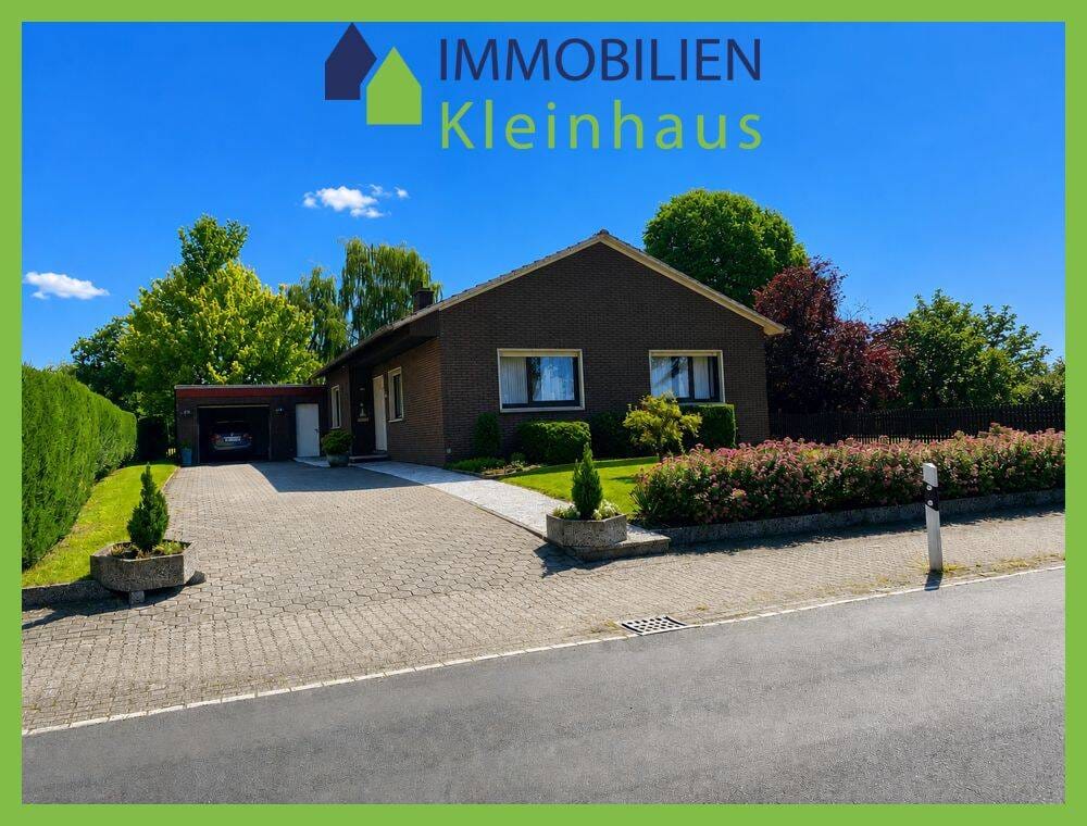Immobilie in Papenburg - Gepflegtes ebenerdiges Wohnhaus mit Einliegerwohnung in idyllischer Kanallage von Papenburg - Ortsteil Obenende - Bild 0