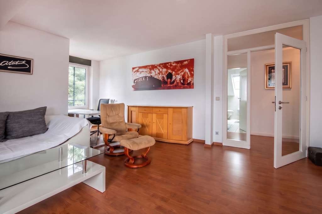 Immobilie in Barsbüttel - Großzügige  2-Zimmer Dachgeschosswohnung mit Balkon, Wohnküche und KFZ Stellplatz in zentraler Lage - Bild 4