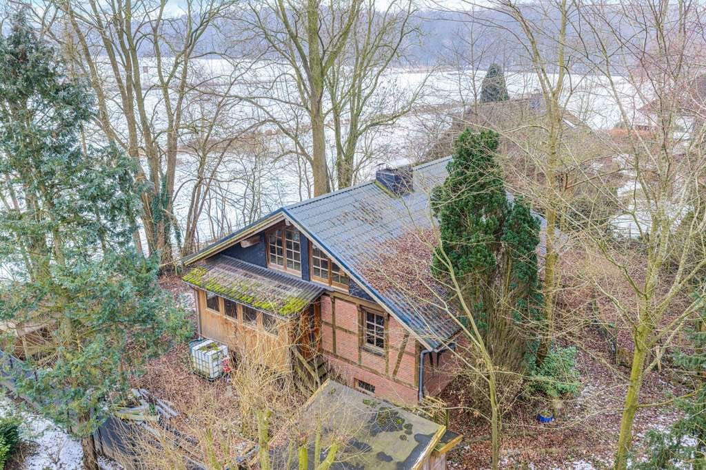 Immobilie in Sievershütten - Architekten-Fachwerk-Blockhaus mit offener Galerie - absolutes Unikat - direkte Feldrandlage mit wun - Bild 1