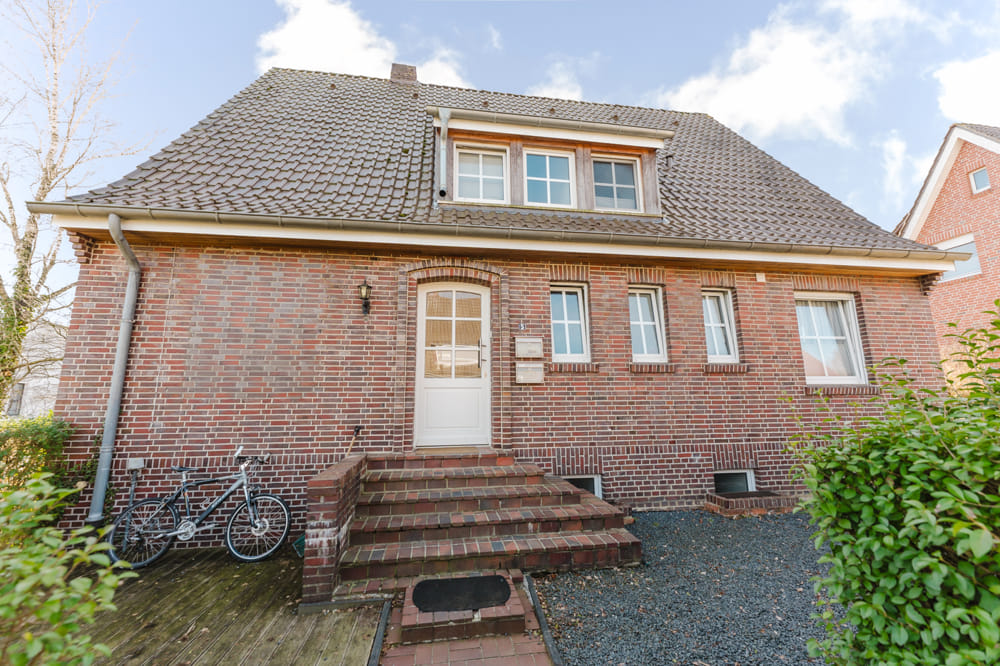 Immobilie in Uelsen - Kapitalanlage in Toplage von Uelsen - Vermietetes Einfamilienhaus mit Einliegerwohnung - Bild 2