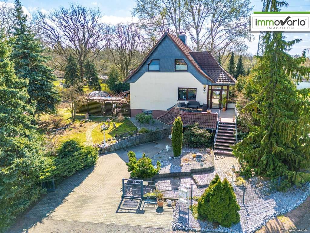 Immobilie in Elbe-Parey - Wohntraum mit XXL-Grundstück: Freistehendes Einfamilienhaus mit Pool, Wintergarten, Sauna und Kamin - Bild 0