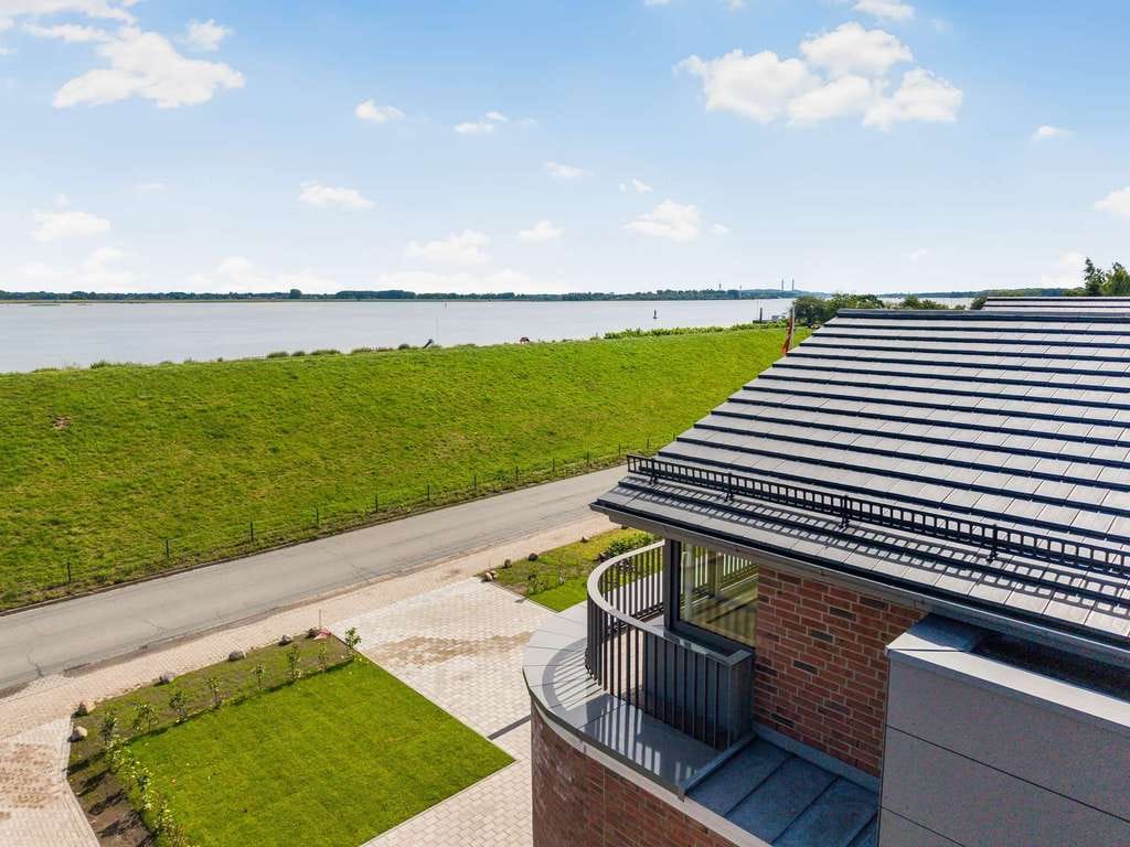 Immobilie in Grünendeich - Elbblick. Architektur. Komfort. – außergewöhnliches Wohnen im Alten Land - Bild 3