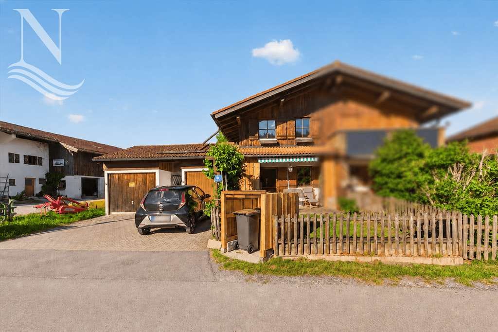 Immobilie in Schleching - Gepflegte Doppelhaushälfte mit Süd-West-Garten und modernisierten Wohnbereichen in ruhiger Lage - Bild 1