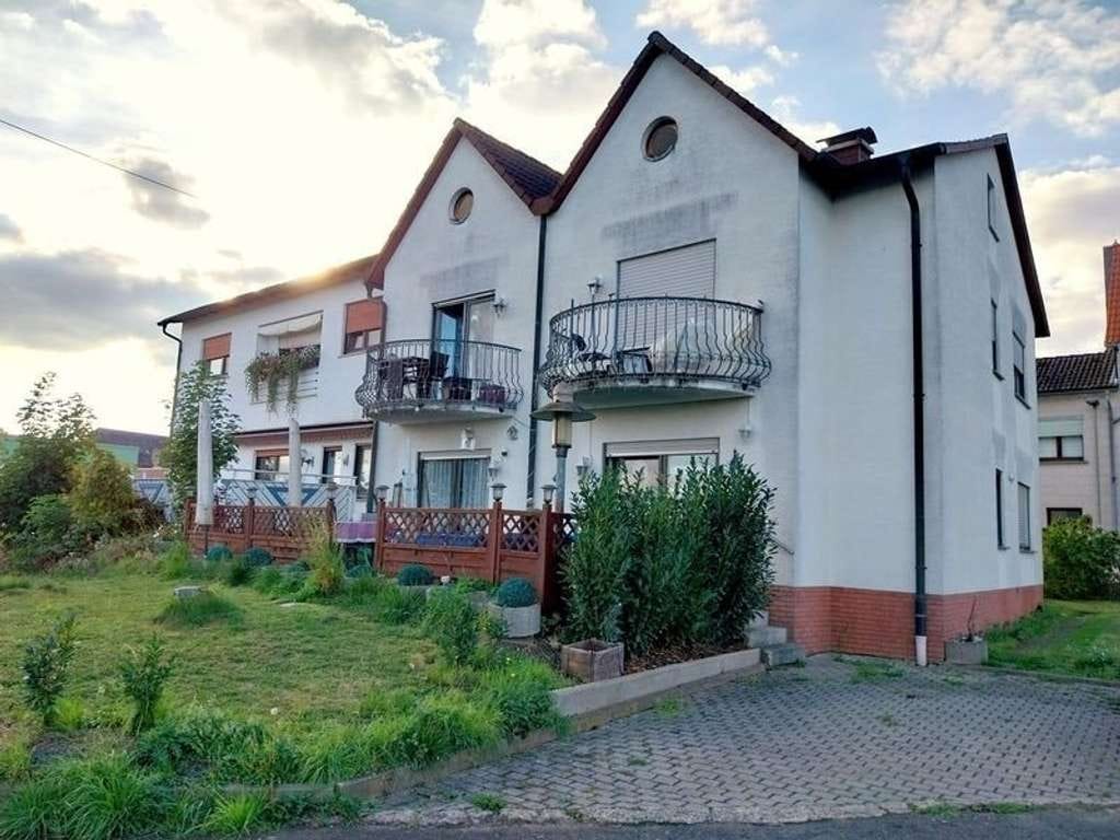 Immobilie in Wölfersheim - 3 Familienhaus mit Frisörsalon in Wölfersheim-Melbach - Bild 1