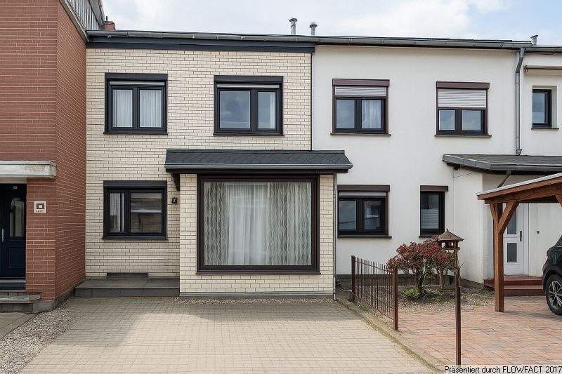 Immobilie in Wolgast - Familienfreundliches Reihenmittelhaus mit Garten in ruhiger Lage in Wolgast mit Einliegerwohnung - Bild 0