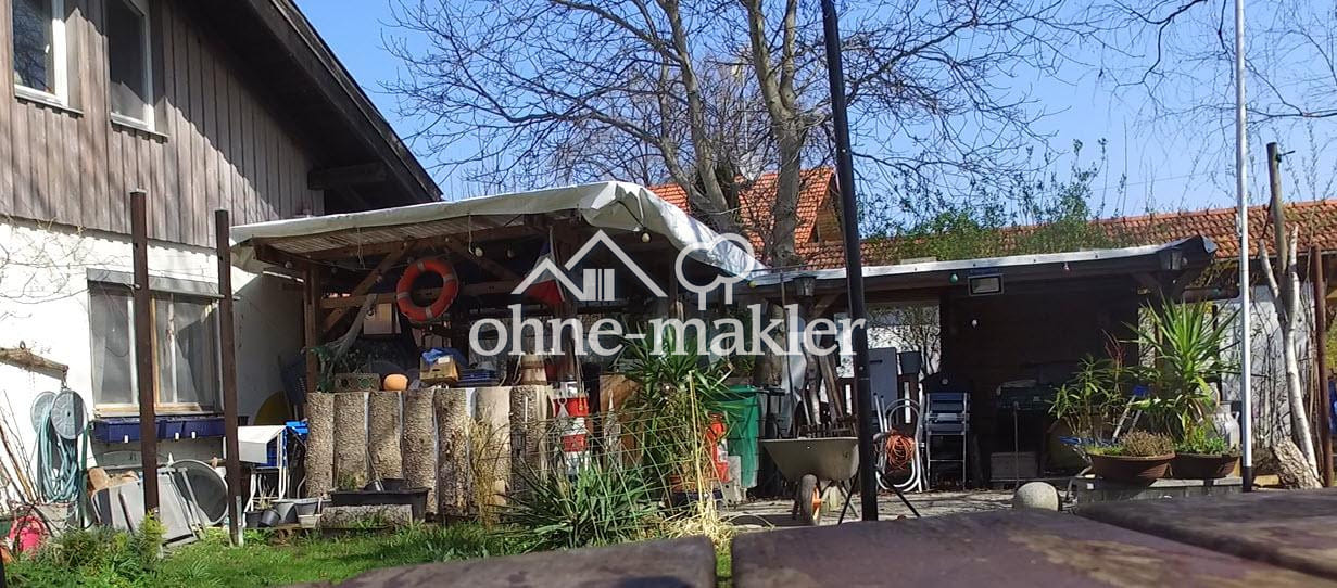 Immobilie in Huglfing - Einfamilienhaus mit 1078m² Grund und teilgewerblicher Nutzungsmöglichkeit in Huglfing - Bild 2