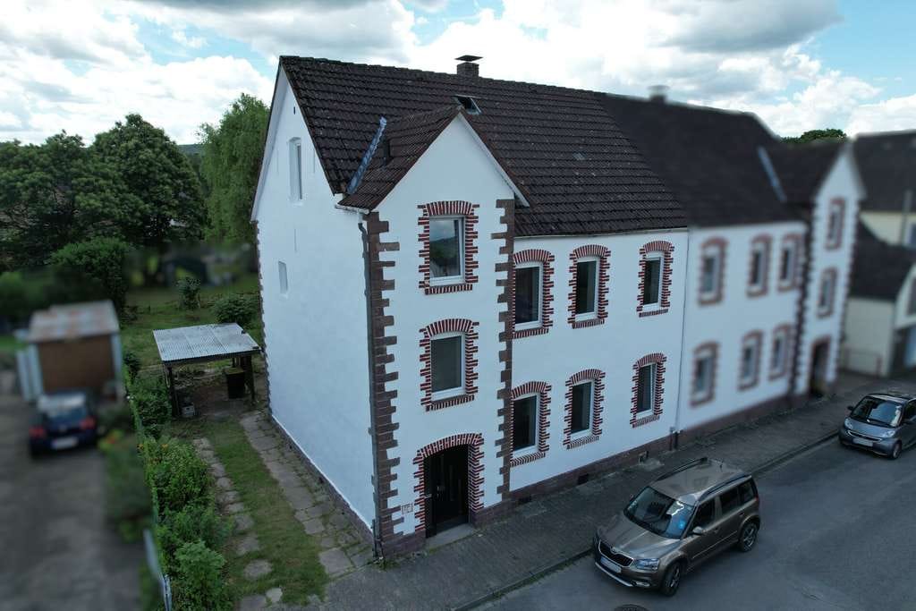 Immobilie in Lauenförde - Provisionsfrei! Sanierte Doppelhaushälfte mit zwei Wohneinheiten und Garten in Lauenförde - Bild 0