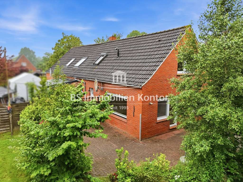 Immobilie in Krummhörn - Groothusen! Doppelhaushälfte mit Garage, Carport und Gartenanlage! - Bild 0