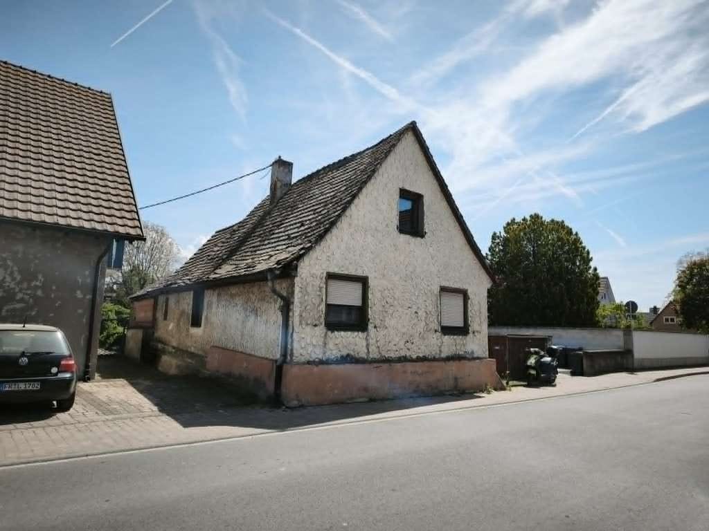 Immobilie in Hartheim am Rhein - Altes Haus mit großem Grundstück und Potenzial - Bild 1