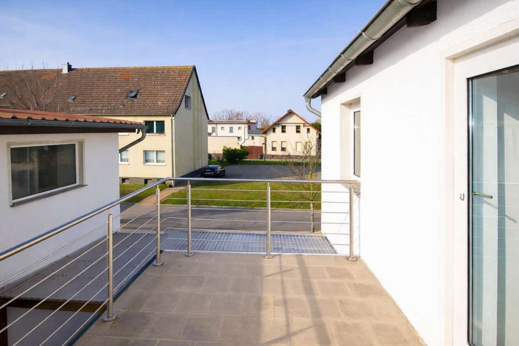 Immobilie in Kroppenstedt - Einfamilienhaus mit Balkon und vielseitiger Ladenfläche – Wohnen, Leben & Gestalten mit Perspektive - Bild 3