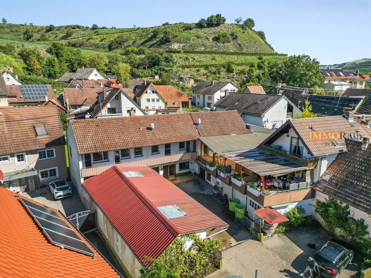 Immobilie in Vogtsburg im Kaiserstuhl - IMMORath.de - Einfamilienhaus mit großzügiger Nutzfläche und Gästezimmern - Bild 0