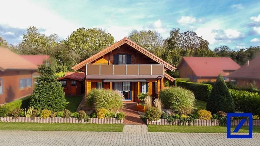 Immobilie in Walchum - Ihr Seeparadies in Walchum: Traum-Holzhaus (2024 saniert) mit Carport und Seezugang - Bild 0