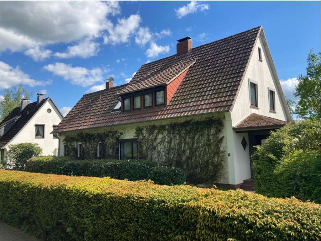 Immobilie in Hambergen - Feines Einfamilienhaus auf schönem Grundstück und in ruhiger Lage - Bild 1