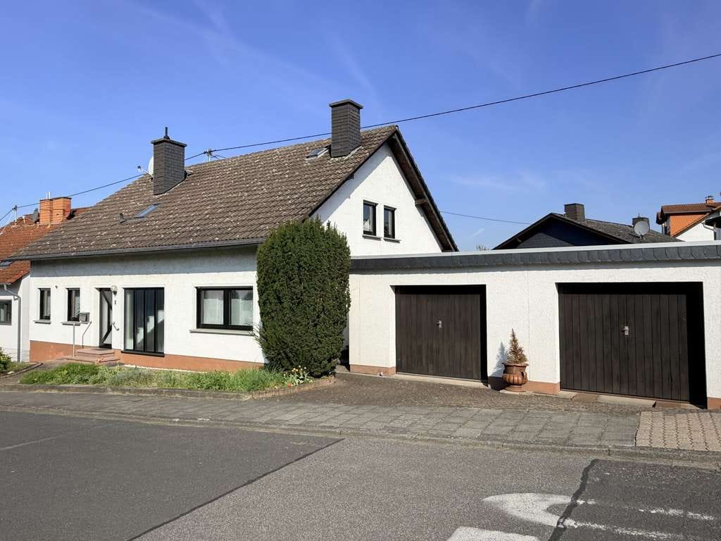 Immobilie in Weitersburg - Wohnen auf zwei Ebenen plus vielseitiges Untergeschoss – Ihr neues Zuhause in Weitersburg - Bild 2