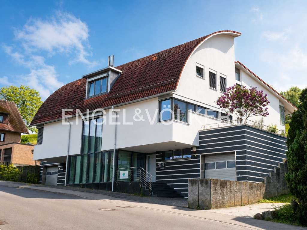 Immobilie in Ammerbuch - Außergewöhnliche Architektur in bester Verarbeitung mit Gartenparadies und Pool - Bild 0