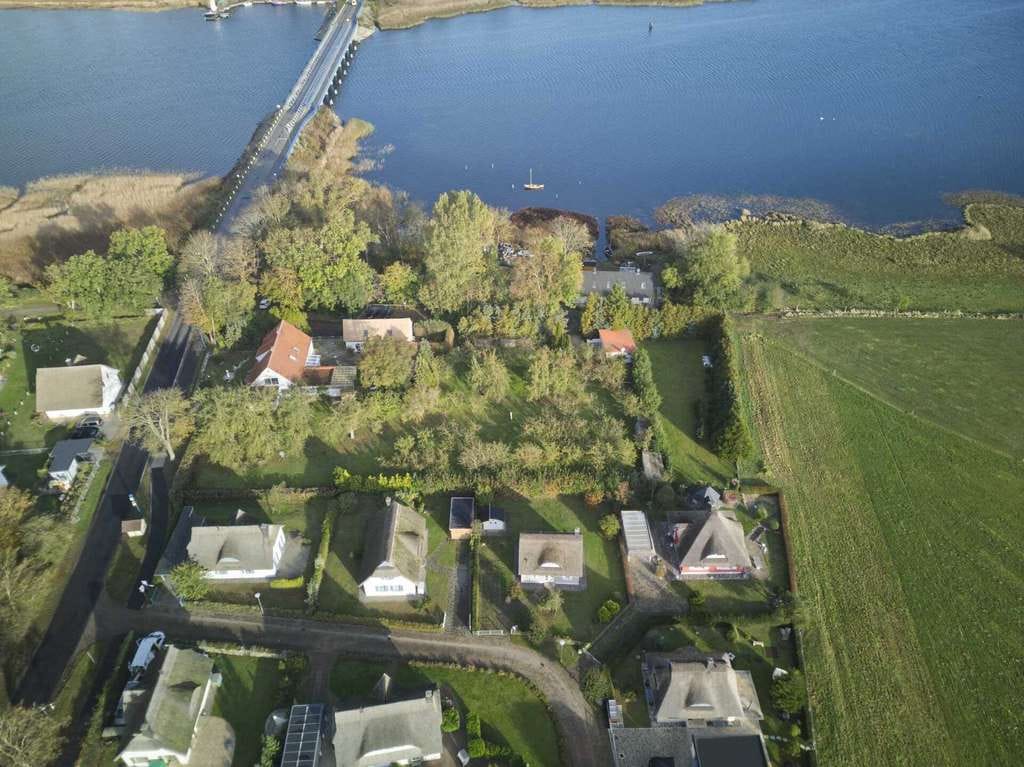 Immobilie in Ummanz - EINMALIG: Wassergrundstück auf der Insel Rügen -EFH mit Fewo + separatem Ferienhaus u.3.800m² Land - Bild 4