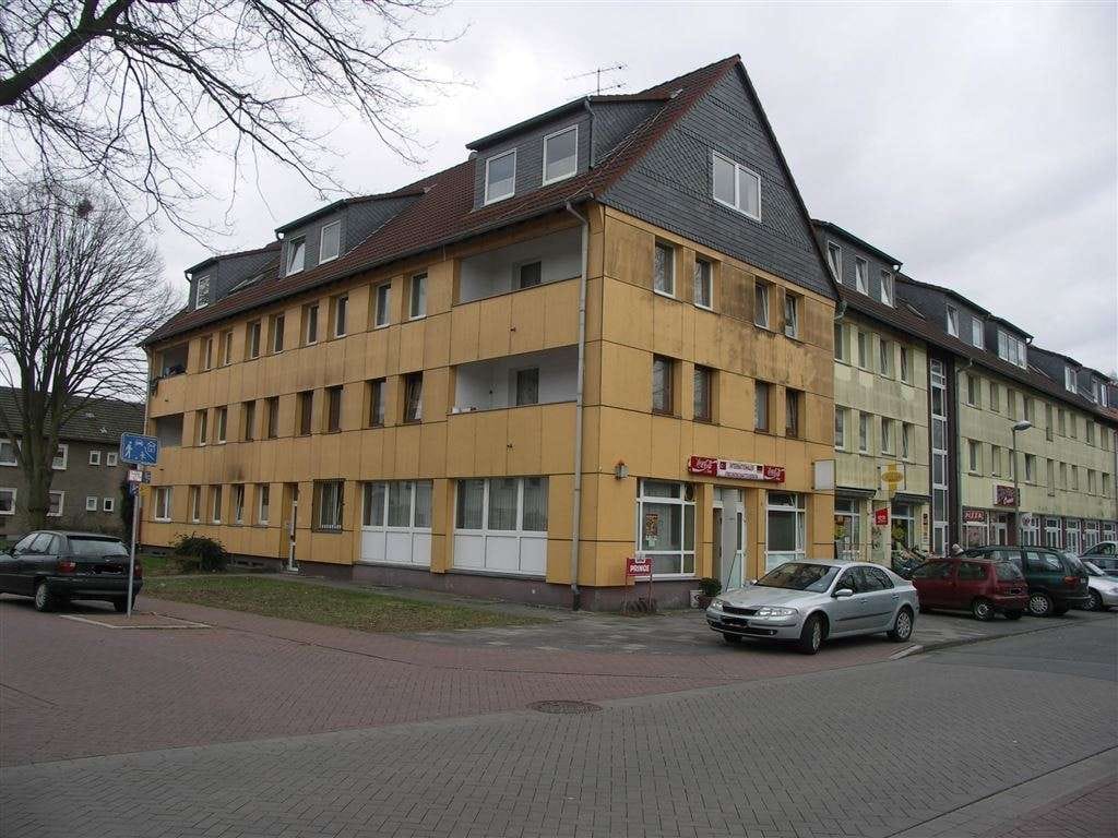 Immobilie in Voerde (Niederrhein) - Provisionsfreies Immobilienpaket! 2 Wohnungen in einem Haus in Voerde zu verkaufen  - Bild 1