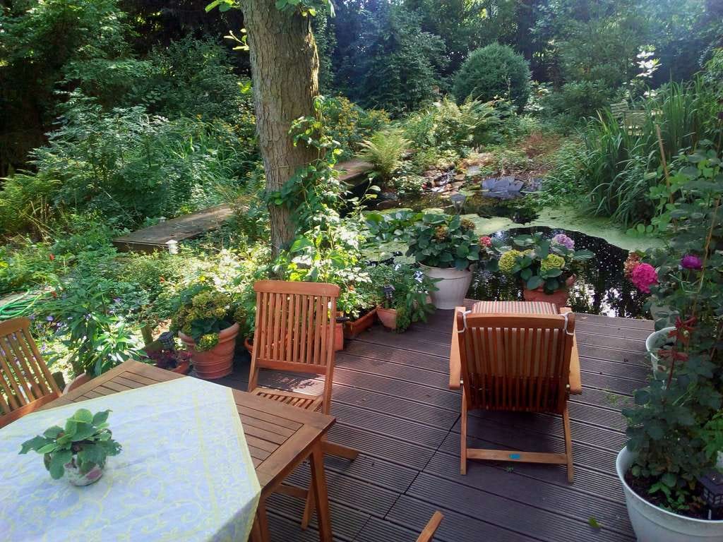 Immobilie in Rheinböllen - Holzhaus mit uneinsehbarem Garten, Sauna und großem Teich in Rheinböllen-Waldsiedlung - Bild 2
