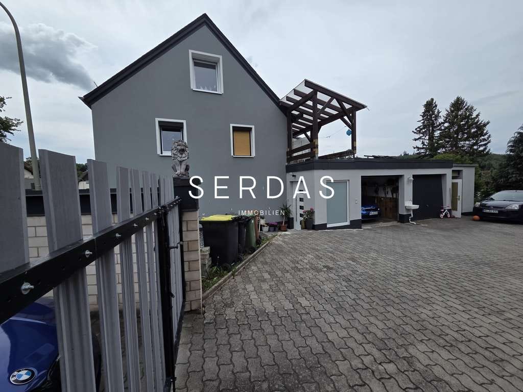 Immobilie in Döhlau - Großzügiges Familienhaus mit hochwertiger Kernsanierung, Garten und Doppelgarage - Bild 3