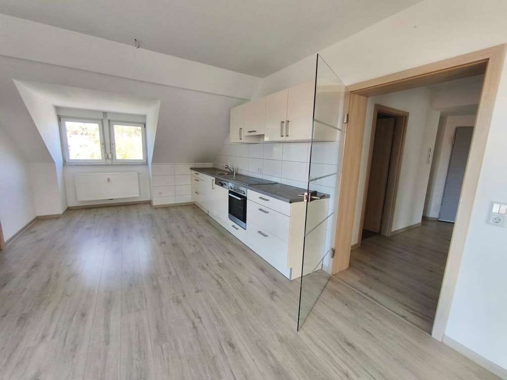 Immobilie in Tonna - Renditeknaller: 3-Zimmer-DG-Wohnung mit Balkon und Stellplätzen – sofort Einnahmen sichern (4040.140 - Bild 1