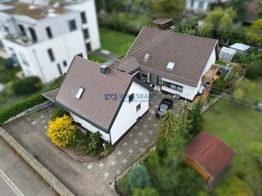 Immobilie in Walldorf - 2 Einfamilienhäuser auf einem großen Grundstück mit Garagen und Garten! - Bild 1