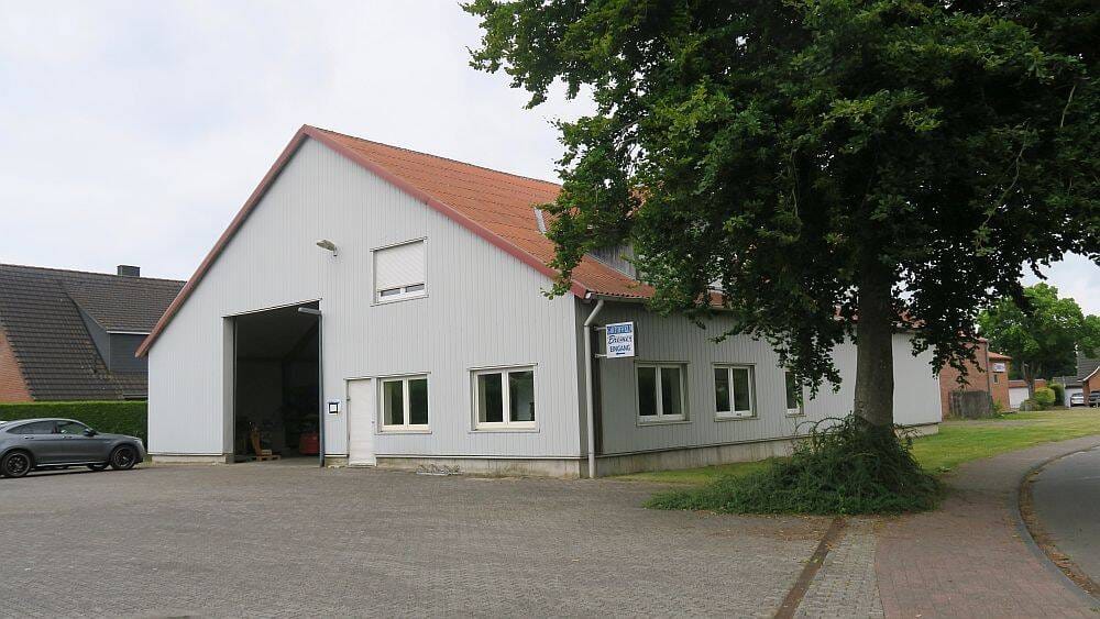 Immobilie in Lohe-Rickelshof - Lohe-Rickelshof: Wohnhaus mit Hallen im Mischgebiet ( ca. 2420 m² ) - Bild 1