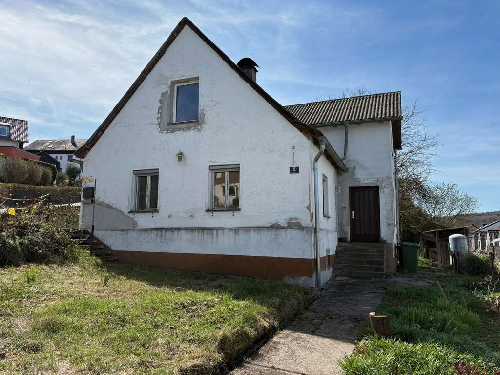 Immobilie in Sinzing - (Bau)Grundstück mit Einfamilienhaus und Garage - Bild 1