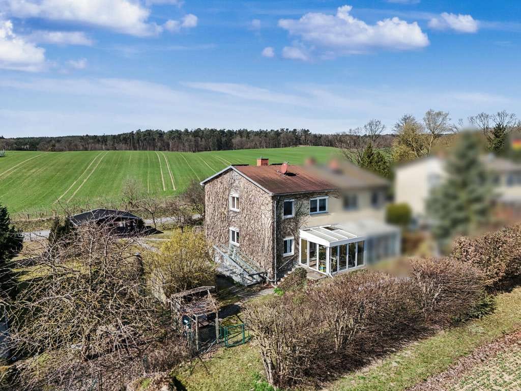 Immobilie in Prötzel - Familienfreundliche Doppelhaushälfte mit Kamin, Wintergarten und Blick ins Grüne! - Bild 0