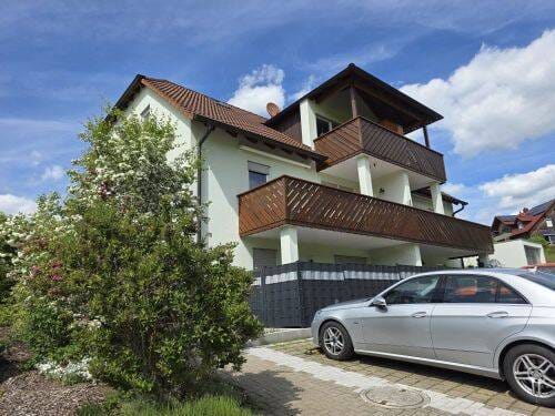Immobilie in Nüdlingen - Herrlicher Ausblick! 2 Zimmer-Eigentumswohnung mit Terrasse und Stellplatz in Nüdlingen Riedweg 75 (ID 10385) - Bild 1
