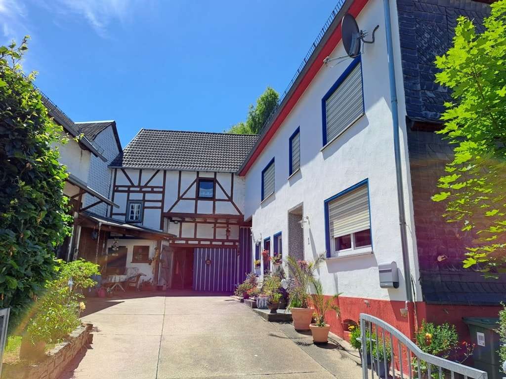 Immobilie in Lingerhahn - Gepflegtes Landhaus mit Nebengebäuden, Garten, Hof und Waldgrundstück in ruhiger Lage in Thörlingen - Bild 0