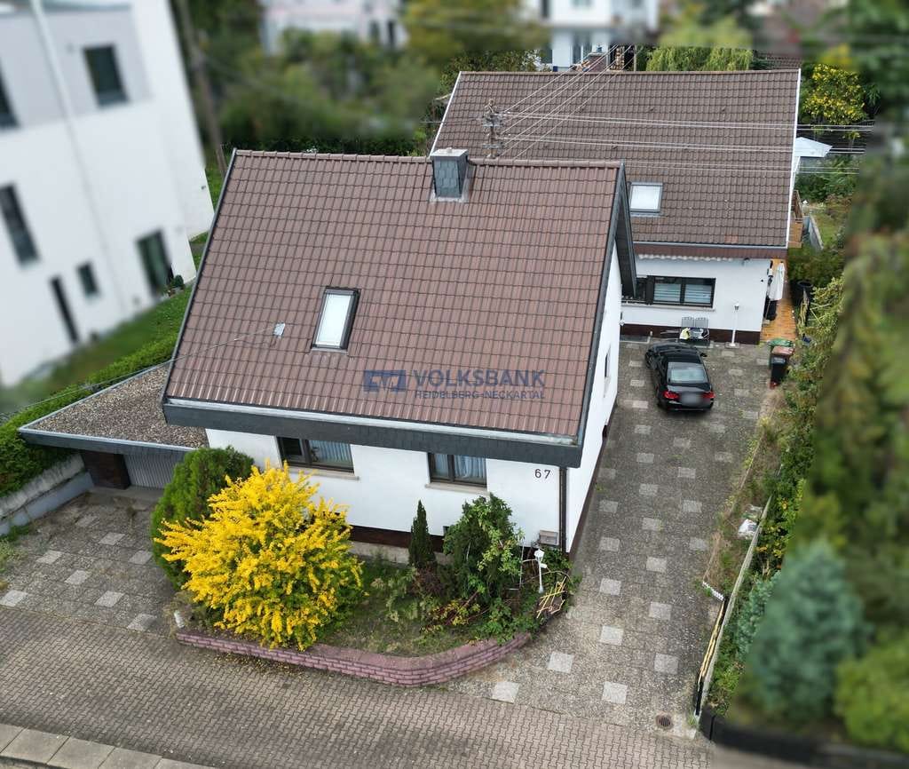 Immobilie in Walldorf - 2 Einfamilienhäuser auf einem großen Grundstück mit Garagen und Garten! - Bild 0