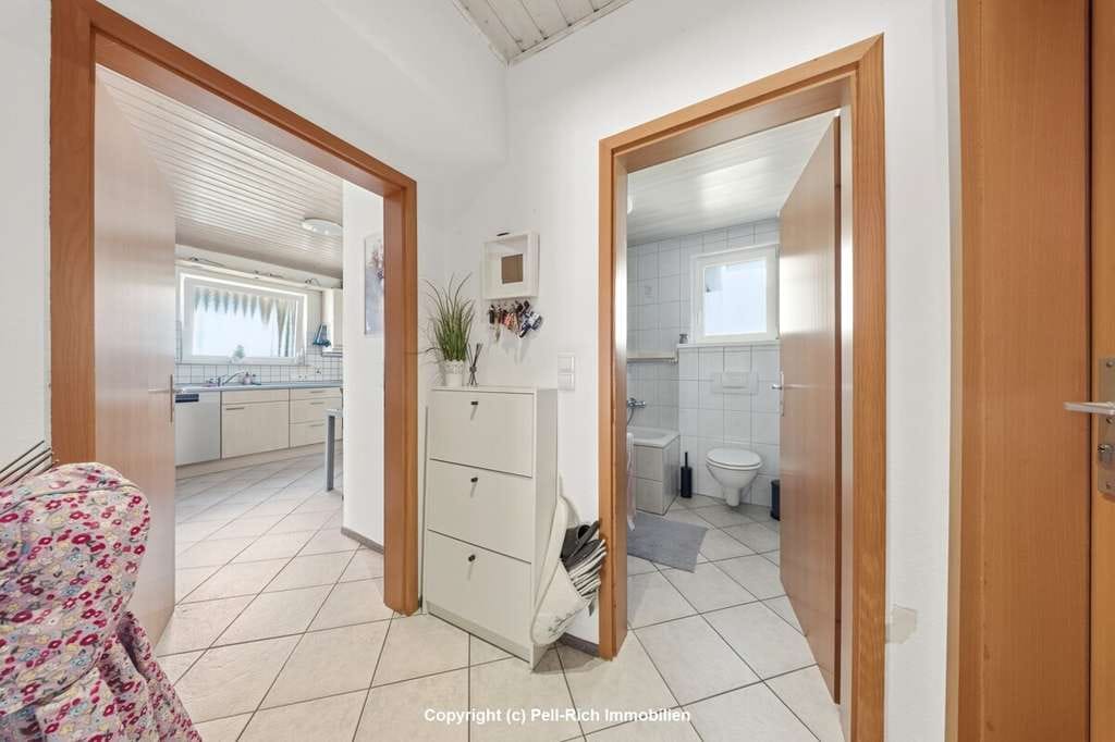 Immobilie in Rülzheim - LIEBLINGSORT: Gemütliche 3,5-Zimmer-Wohnung mit Hobbyraum und eigenem Garten in Rülzheim zum Kauf - Bild 1