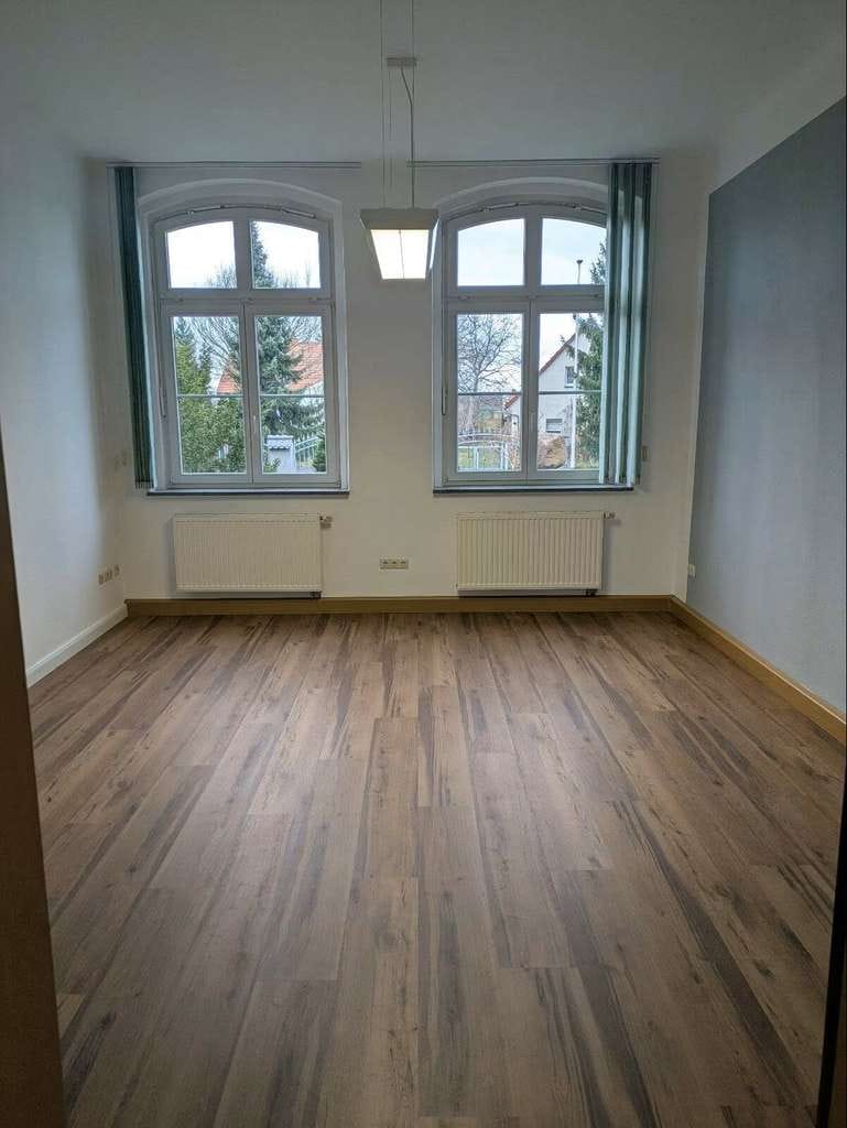 Immobilie in Rothenburg/Oberlausitz - Modernisiertes Mehrfamilienhaus mit attraktiver Gewerbeeinheit – Ihre Investitionschance! - Bild 0