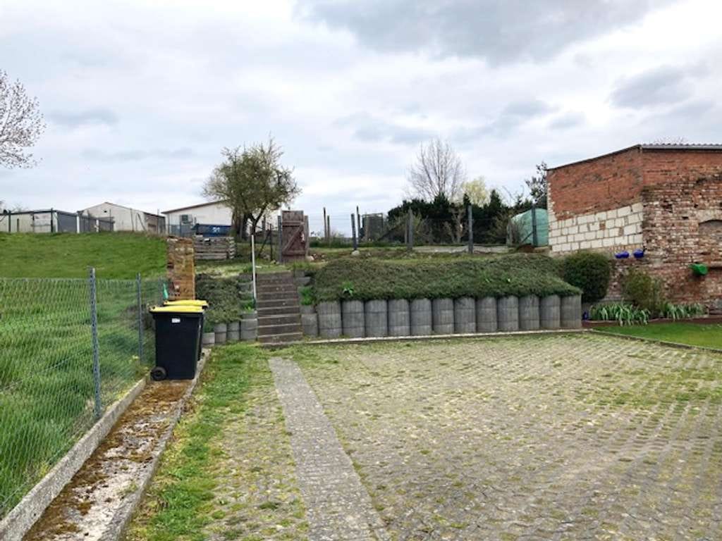 Immobilie in Goldberg - Kleines Stadthaus mit zwei Mietwohnungen, Gewerbefläche und großzügigem Grundst - Bild 1
