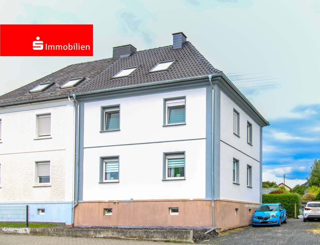 Immobilie in Hadamar - Charmante Doppelhaushälfte mit Terrassen, großem Garten und Ausbaupotenzial in Hadamar-Oberzeuzheim  - Bild 0