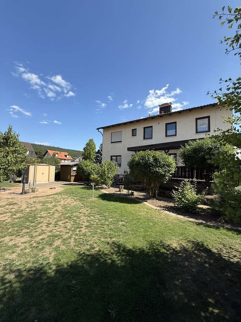 Immobilie in Wörth am Main - Freistehendes 2 Familienhaus mit Garage & geflegtem Garten in Wörth - Bild 3