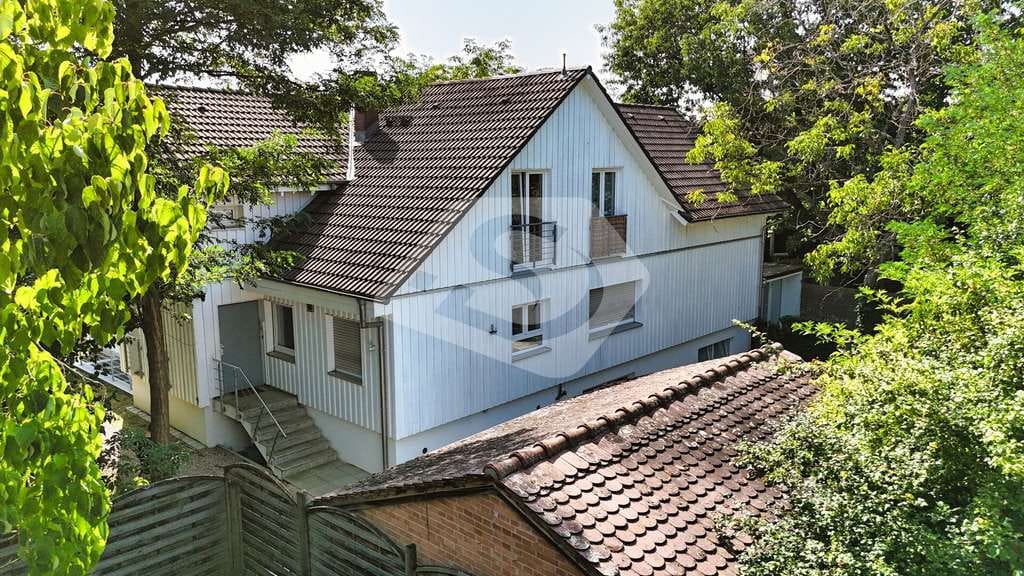Immobilie in Freiburg im Breisgau - Ein Haus voller Licht, Ruhe und Wohnqualität - Bild 2
