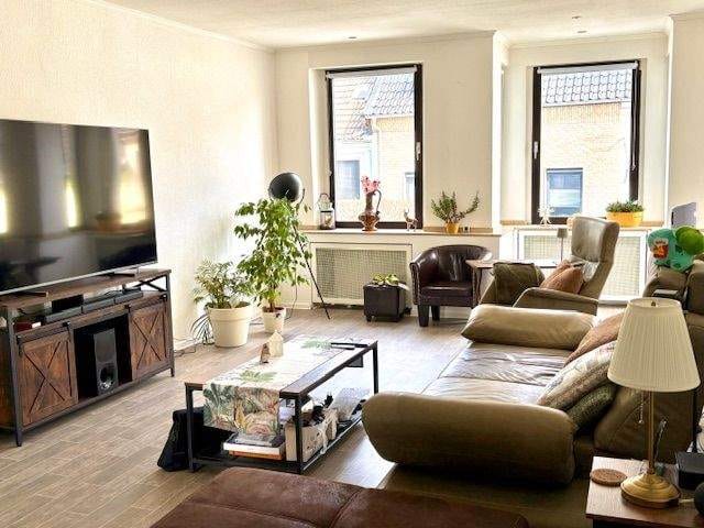 Immobilie in Rheinberg - Gepflegtes Wohn-Geschäftshaus mit großem LadenlokalGewerbeeinheit - Bild 1
