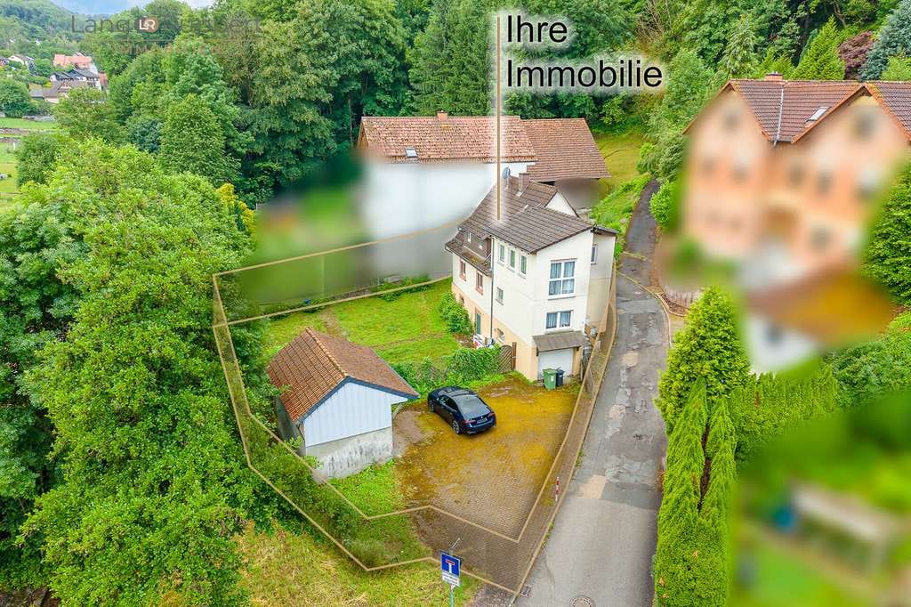 Immobilie in Wald-Michelbach - Familienfreundliches Wohnen mit Garten, Garage und Entwicklungspotenzial - Bild 0