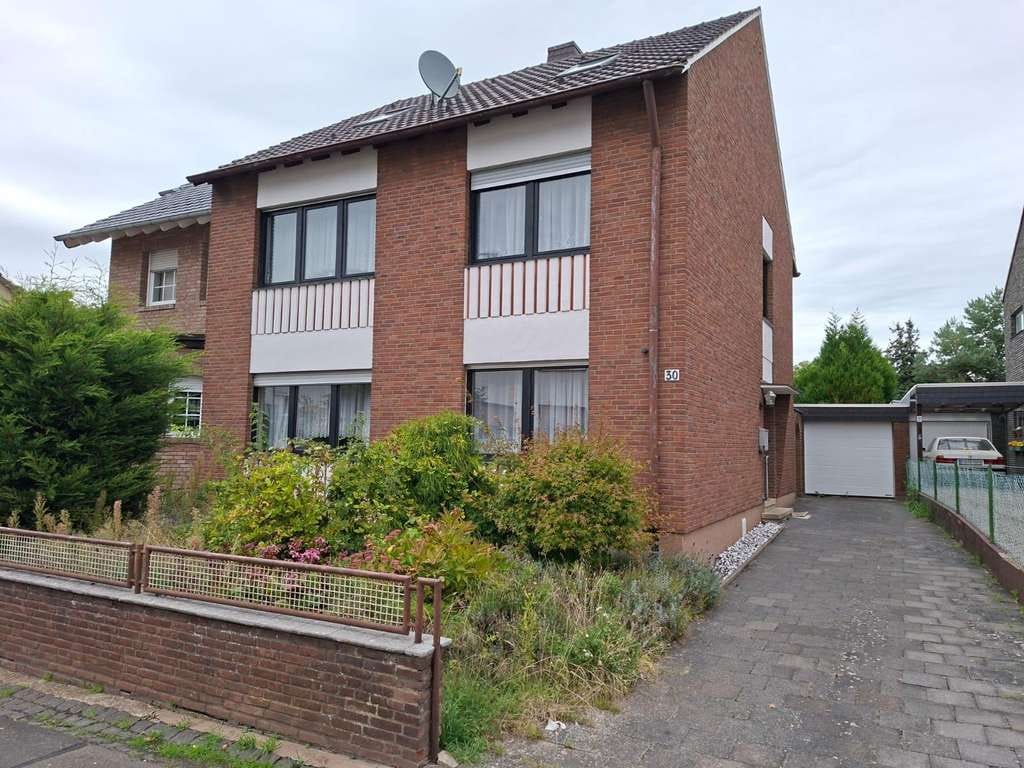 Immobilie in Zülpich - Gepflegtes einseitig angebautes Einfamilienhaus mit 6 Zimmern in Zülpich - Bild 0