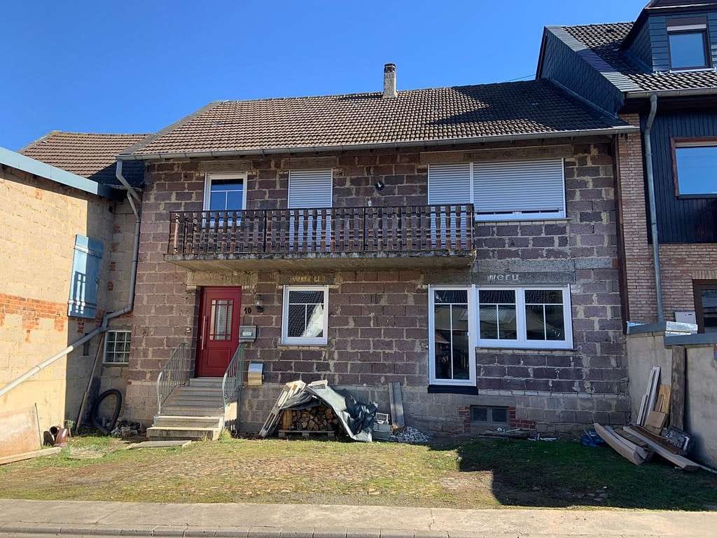 Immobilie in Merxheim - Vermietetes Zweifamilienhaus mit Nebengebäude und Gartengrundstück - Bild 0