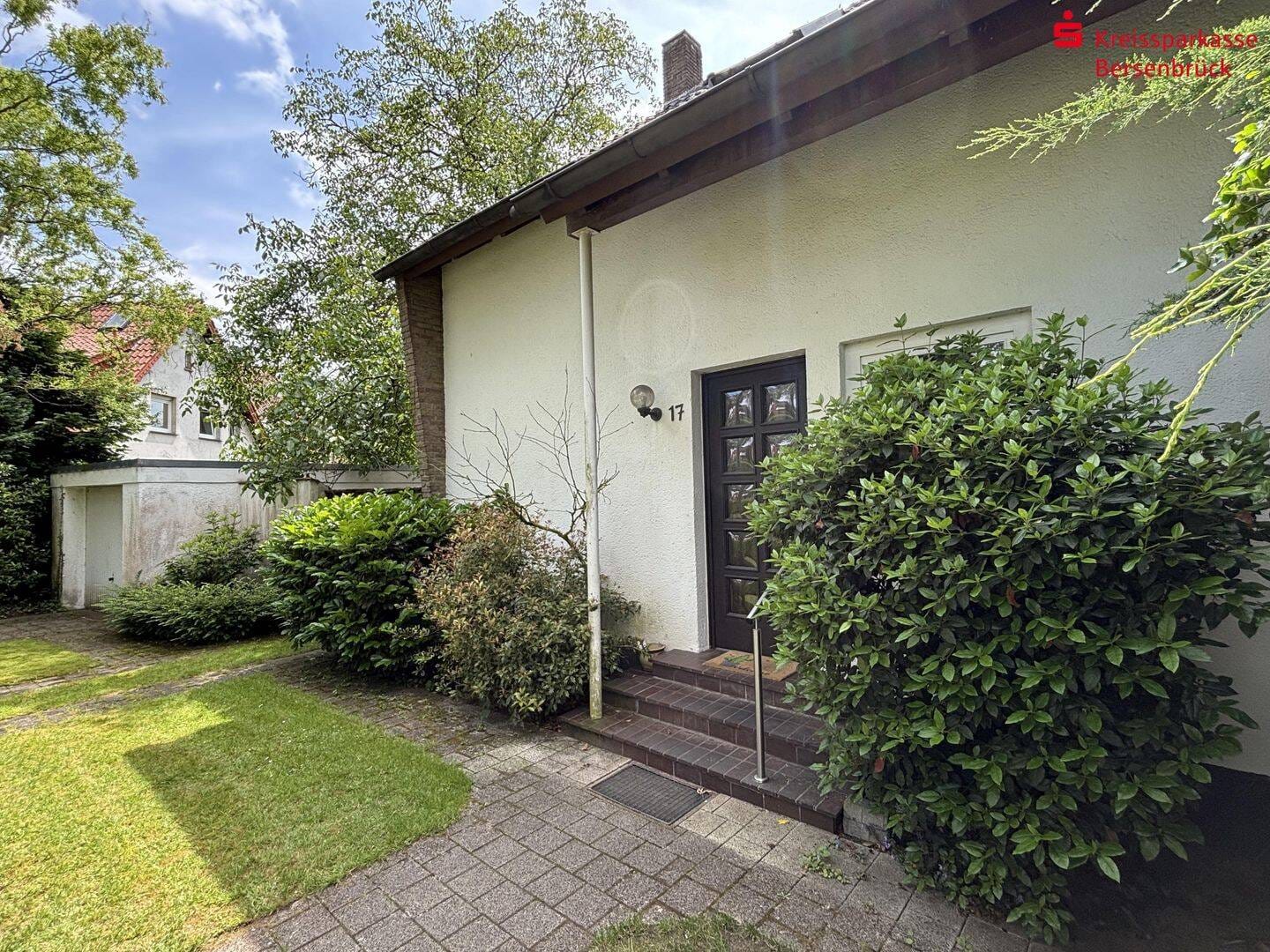 Immobilie in Bramsche - Idyllisches Zweifamilienhaus in der Bramscher Gartenstadt - Bild 1