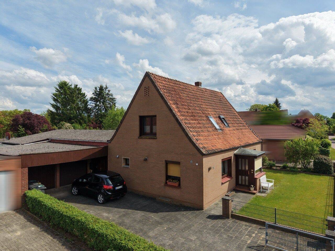 Immobilie in Eystrup - Eystrup: Zwei Wohnwelten unter einem Dach – Einfamilienhaus mit Einliegerwohnung - Bild 3