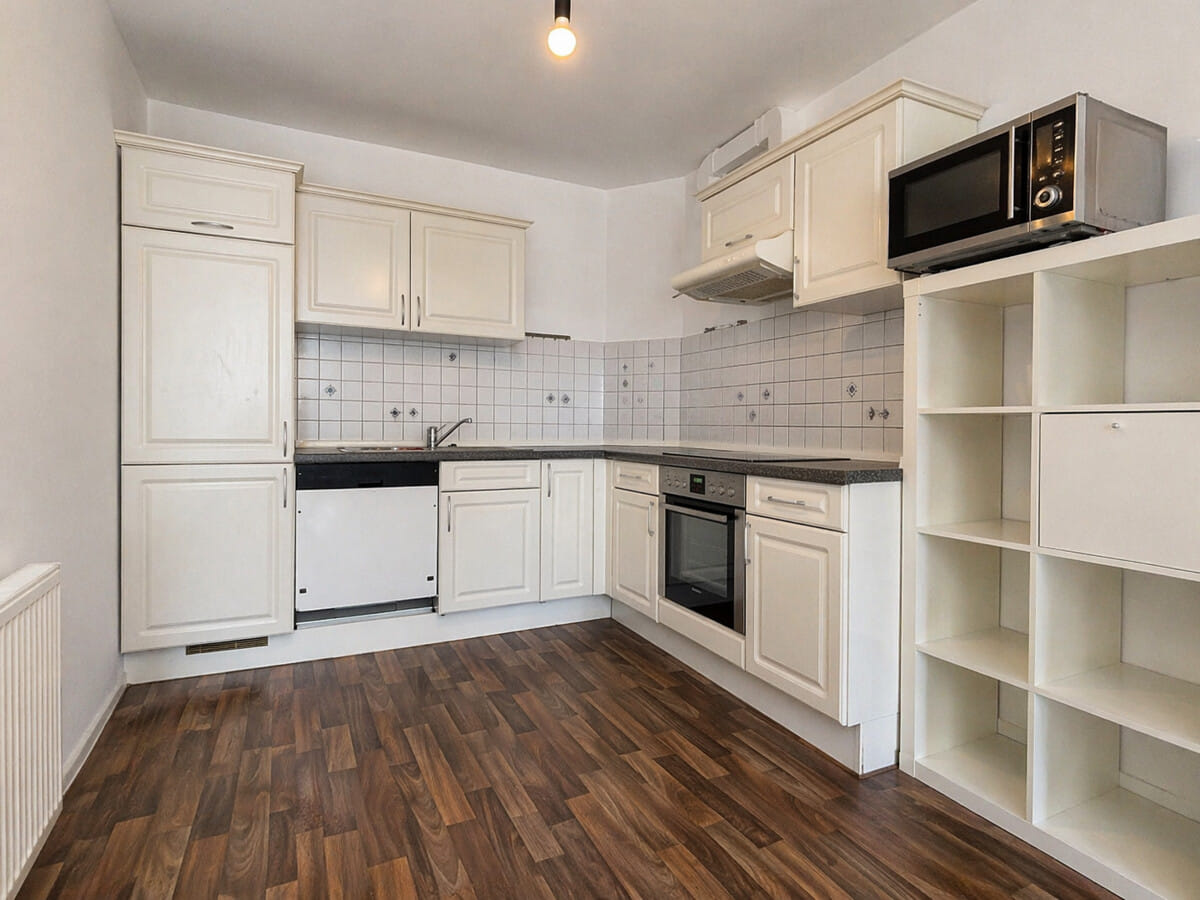 Immobilie in Wiefelstede - Attraktive Kapitalanlage: Vermietete Dachgeschosswohnung mit Balkon & Stellplatz in Metjendorf - Bild 4