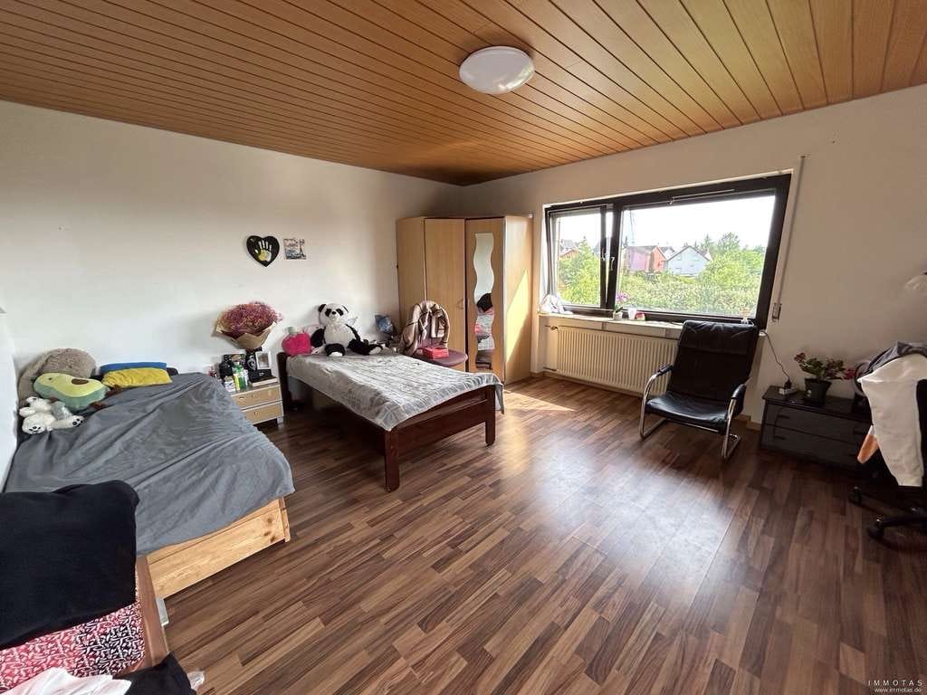 Immobilie in Riegelsberg - Zweifamilienhaus mit großem Garten und Garage - Bild 4