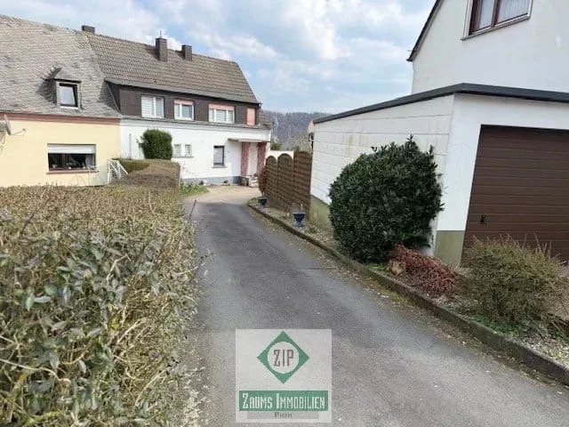 Immobilie in Prüm - Einfamilien-Reihenendhaus in zentraler Lage mit unverbaubarem Fernblick und Garage in Prüm - Bild 1