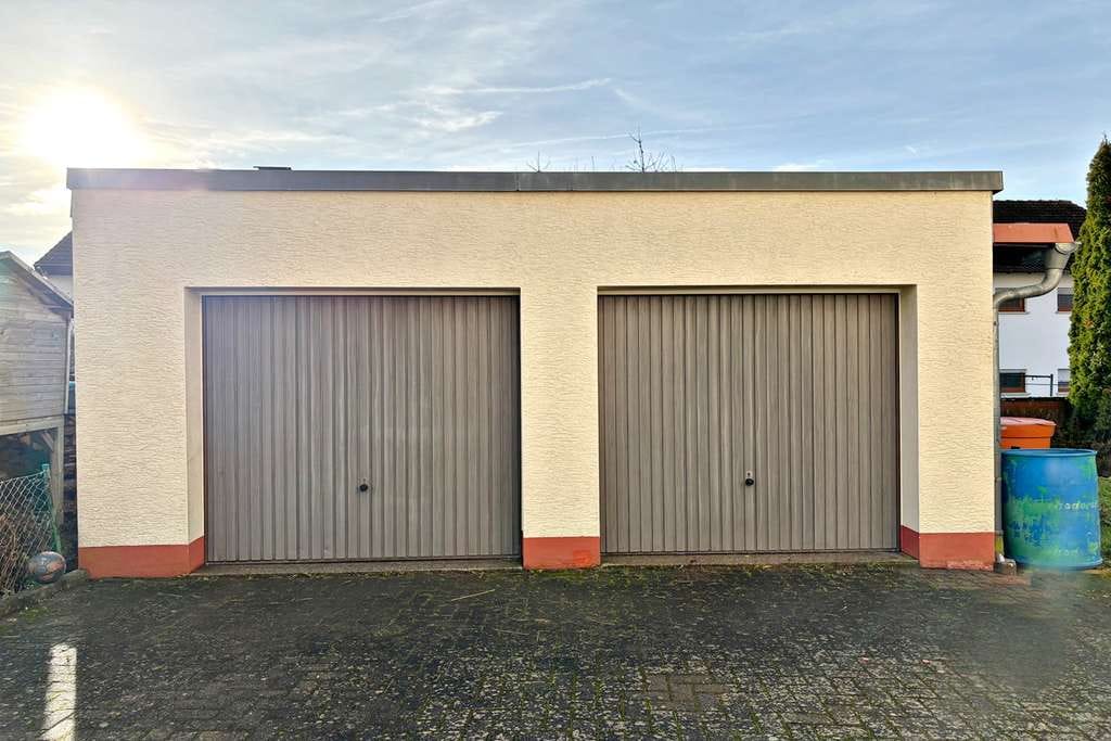 Immobilie in Johannesberg - VERMIETETES 2-FAMILIENHAUS MIT DOPPELGARAGE + GROSSEM GRUNDSTÜCK IN JOHANNESBERG - Bild 3